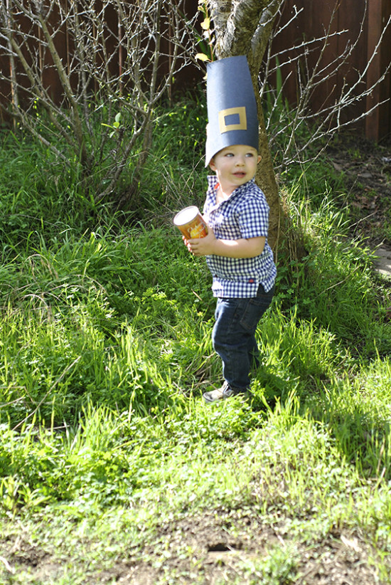 little boy with pumpkin can in Thanksgiving DIY hat