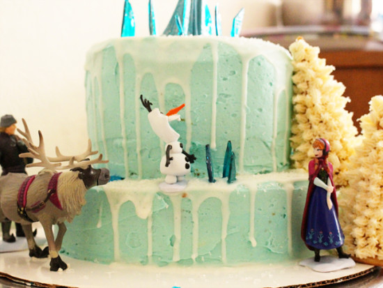 Frozen birthday cake with Olaf and Anna figurines