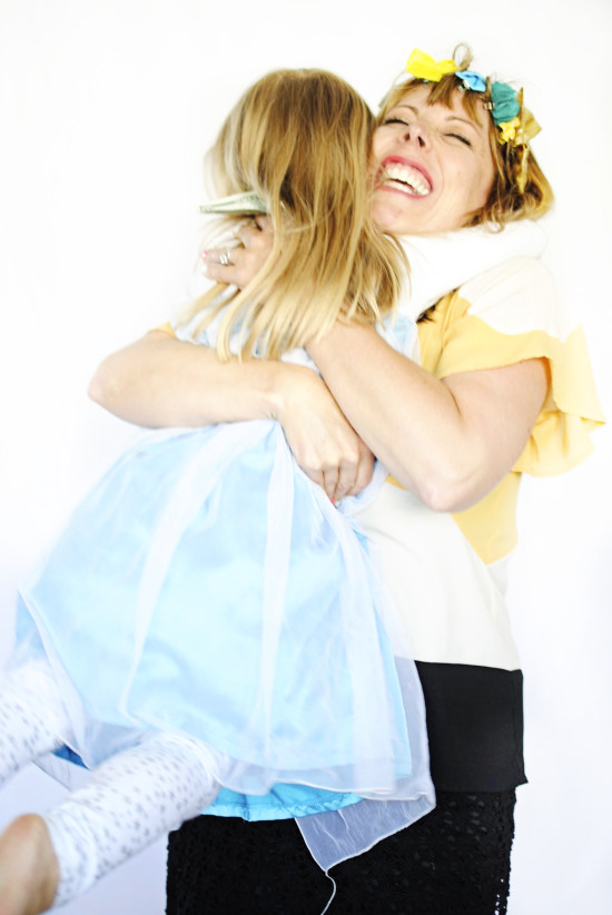 mom hugging daughter after playing hairdresser -- Fabulistas